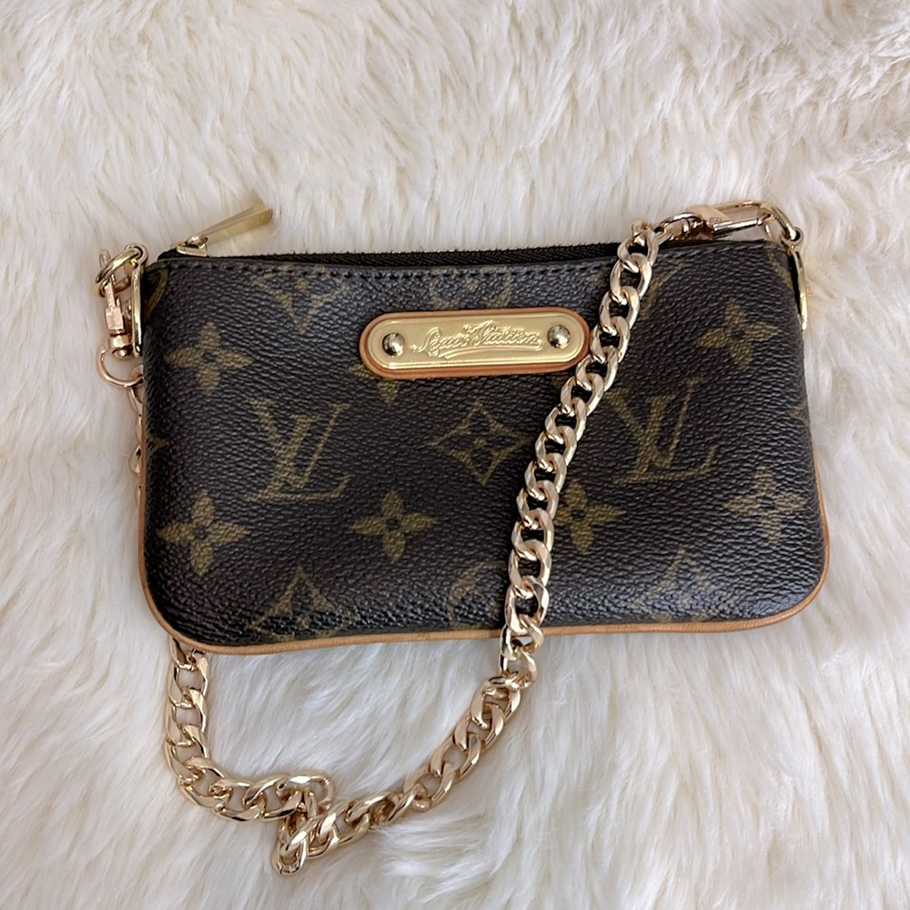 Authentic Louis Vuitton Rare Milla Pochette PM monogram pouch